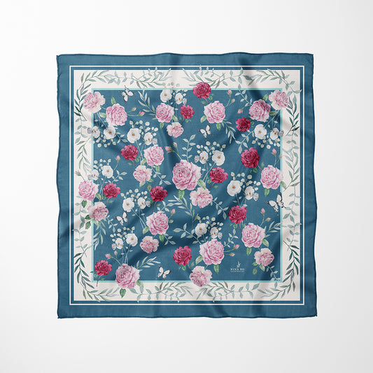 Garden rose silk scarf laid flat, revealing the full watercolor garden scene with blooming roses and white camellias-Nina Ho Illustration