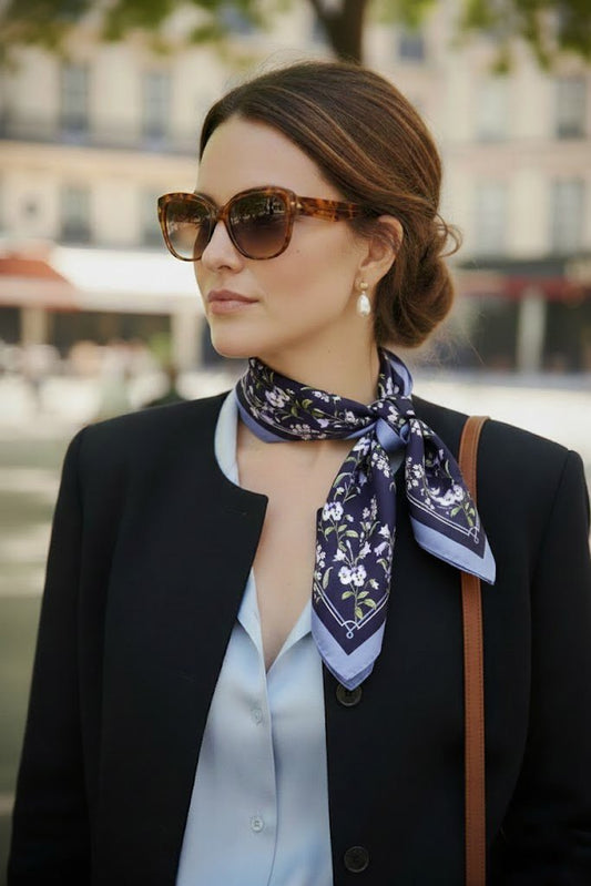 Sophisticated woman in Parisian chic wearing a double-sided mulberry silk scarf with delicate bellflower botanical print by Nina Ho Illustration