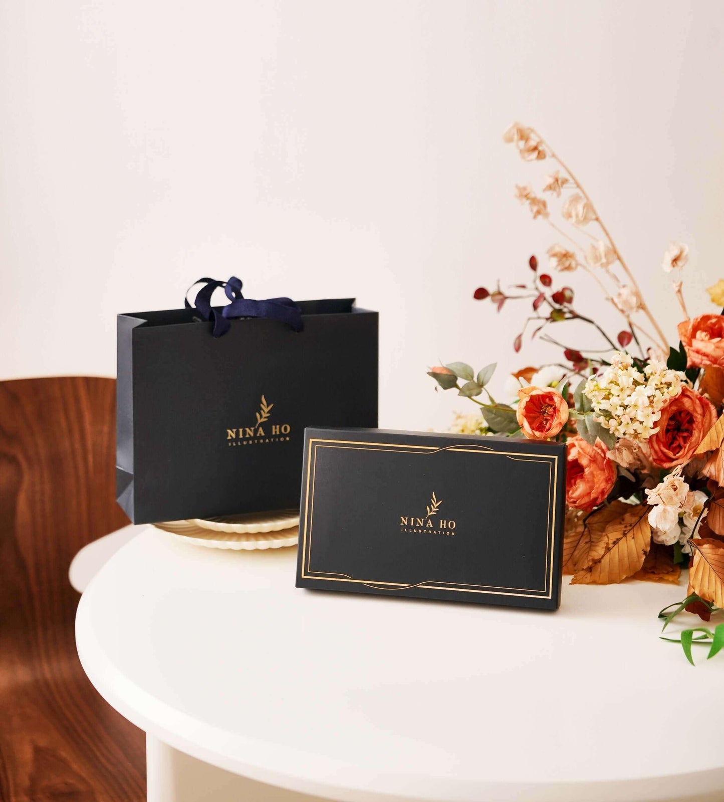 Luxury NINA HO ILLUSTRATION silk scarf signature gift box packaging. An elegant, ready-to-gift presentation for art lovers and special occasions.