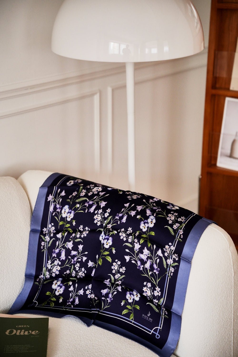 Elegant 100% mulberry silk scarf in purple-blue hues with hand-painted Bellflower and Pansy motifs by Nina Ho Illustration.